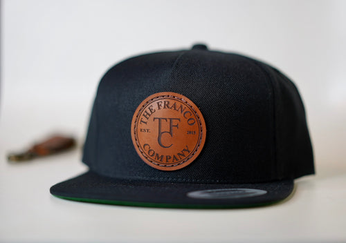 custom designed hat with leather patch