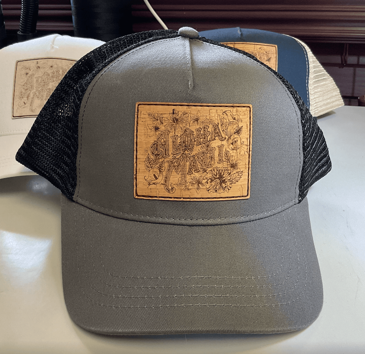 Aloha Maui Eco Trucker Hat – Engraved Cork Patch, Organic Cotton & Recycled Polyester (Wholesale)