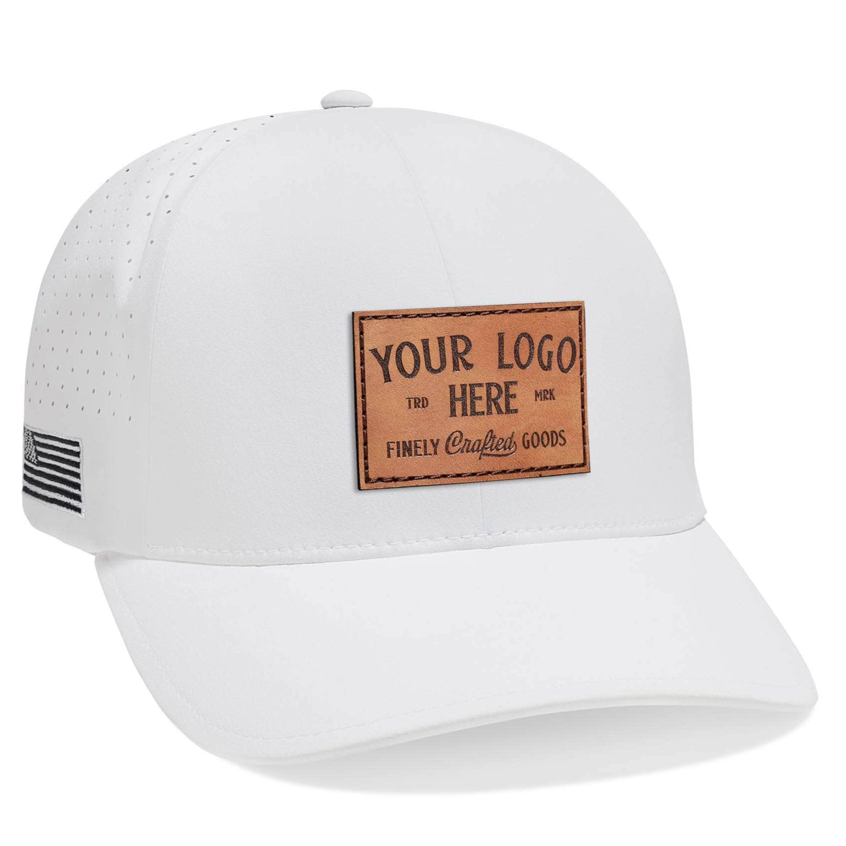 The Flexfit 180AP Delta® cap features a perforated back, brown leather patch on the front labeled Your Logo Here, Finely Crafted Goods, an embroidered black and white flag on the side, and a snapback closure for an ideal fit. Available for bulk customization with your logo.