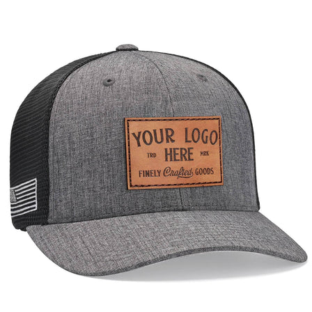 A Flexfit 110M(T) Stretch Mesh Snapback Cap featuring a gray and black design with Custom - Your Logo Here embroidered in white on the front, a mesh back, and a small brown-striped patch on the side. Ideal for displaying your corporate logo.