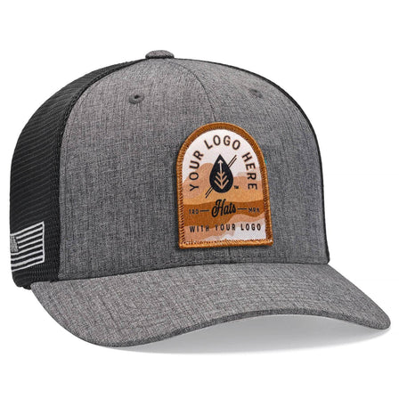 A Flexfit 110M(T) Stretch Mesh Snapback Cap featuring a gray and black design with Custom - Your Logo Here embroidered in white on the front, a mesh back, and a small brown-striped patch on the side. Ideal for displaying your corporate logo.