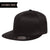 A black Flexfit 6297F Pro-Baseball Flat Bill Hat with a round sticker on the brim can be customized with your logo. The Customize Yours banner in the top left corner highlights this classic design, perfect for bulk orders.